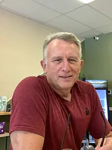Coach Gregory Scott